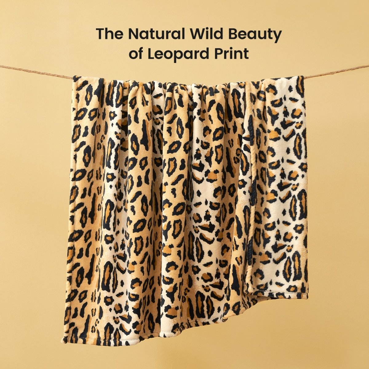 Leopard print milkyplush throw blanket in Brown Leopard displayed hanging, highlighting natural animal print pattern #color_Brown Leopard