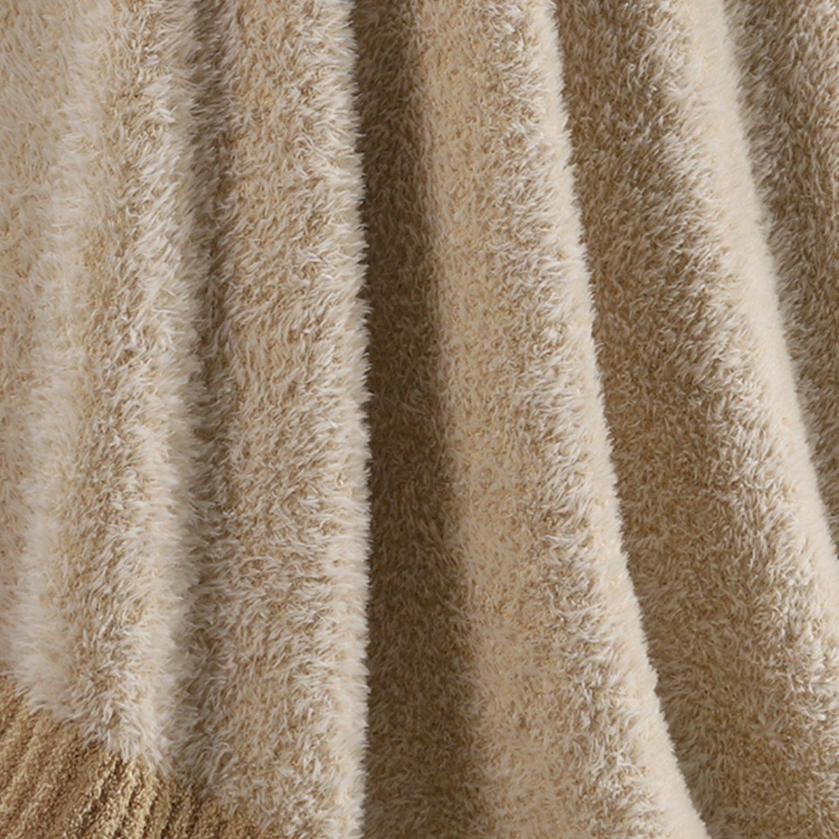 Macro close-up of faux mink fibers on Faux Mink Feather Knit Throw Blanket in Beige showcasing ultra soft and fluffy texture detail. #color_Beige