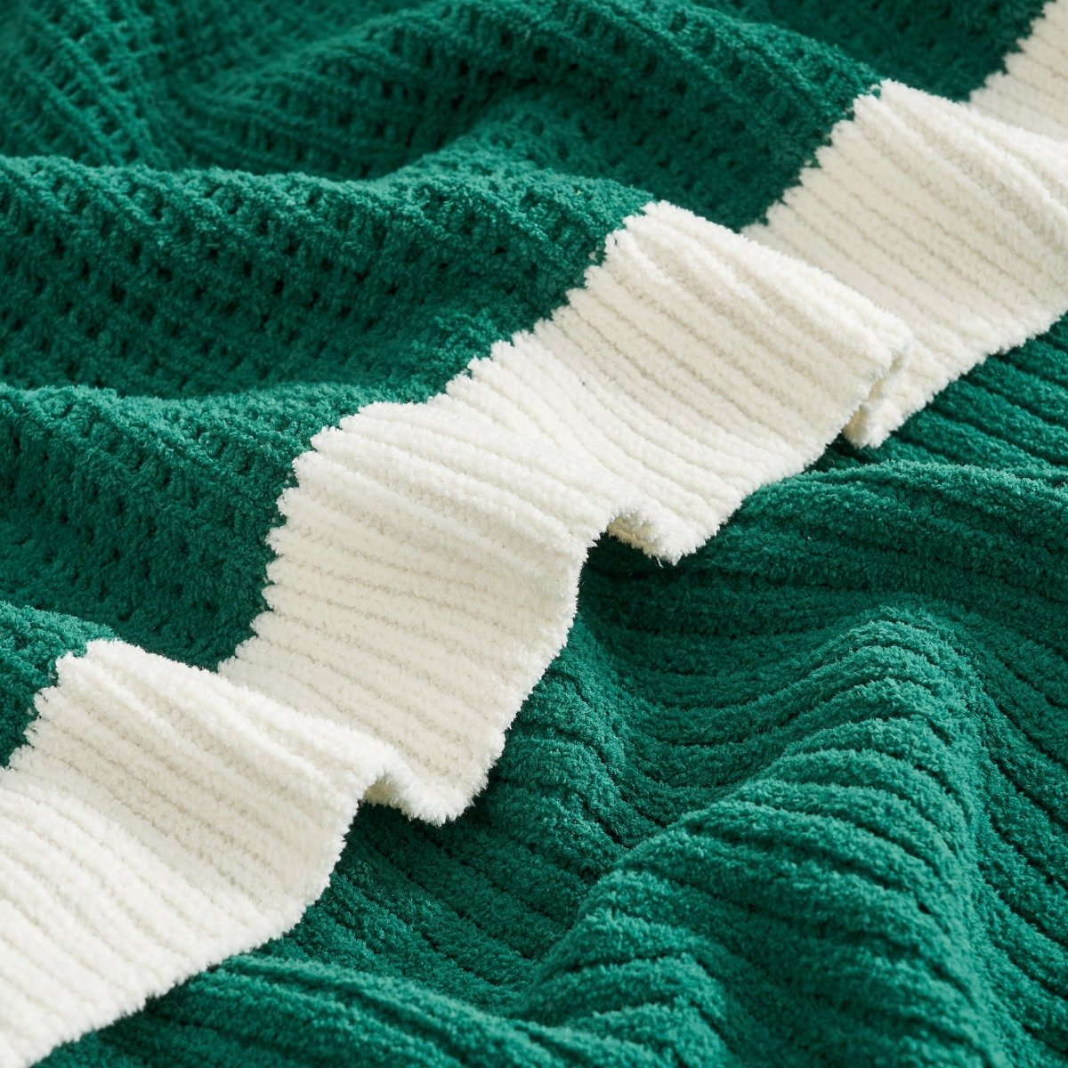 Close-up of Chenille Waffle Knit Throw Blanket in Green highlighting plush chenille yarn and breathable knit. #color_Green