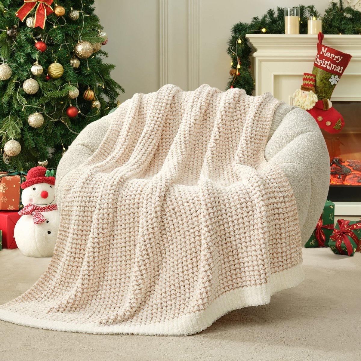 Cream/Beige textured blanket draped over a chair with a side table and flowers in the background. #color_Cream/Beige