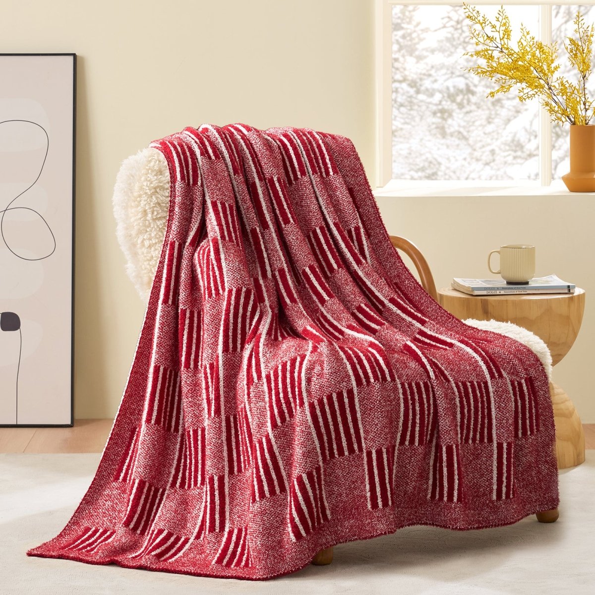 Reversible Heather Checkered Feather Yarn Throw Blanket in Red draped over an armchair, showcasing its bold color and checkered design. #color_Christmas Red