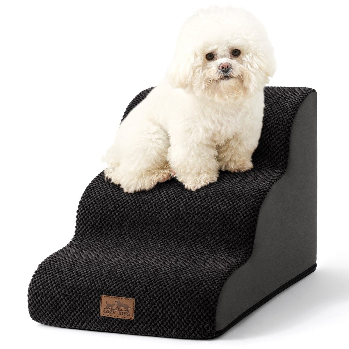 White dog sitting on a black pet stairs with a visible brand logo.#Color_Black