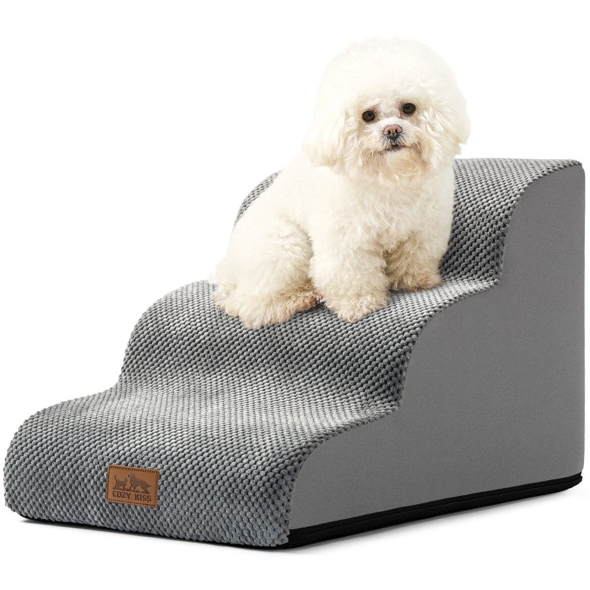 Small white dog sitting on a gray pet ramp with a white background#Color_Grey