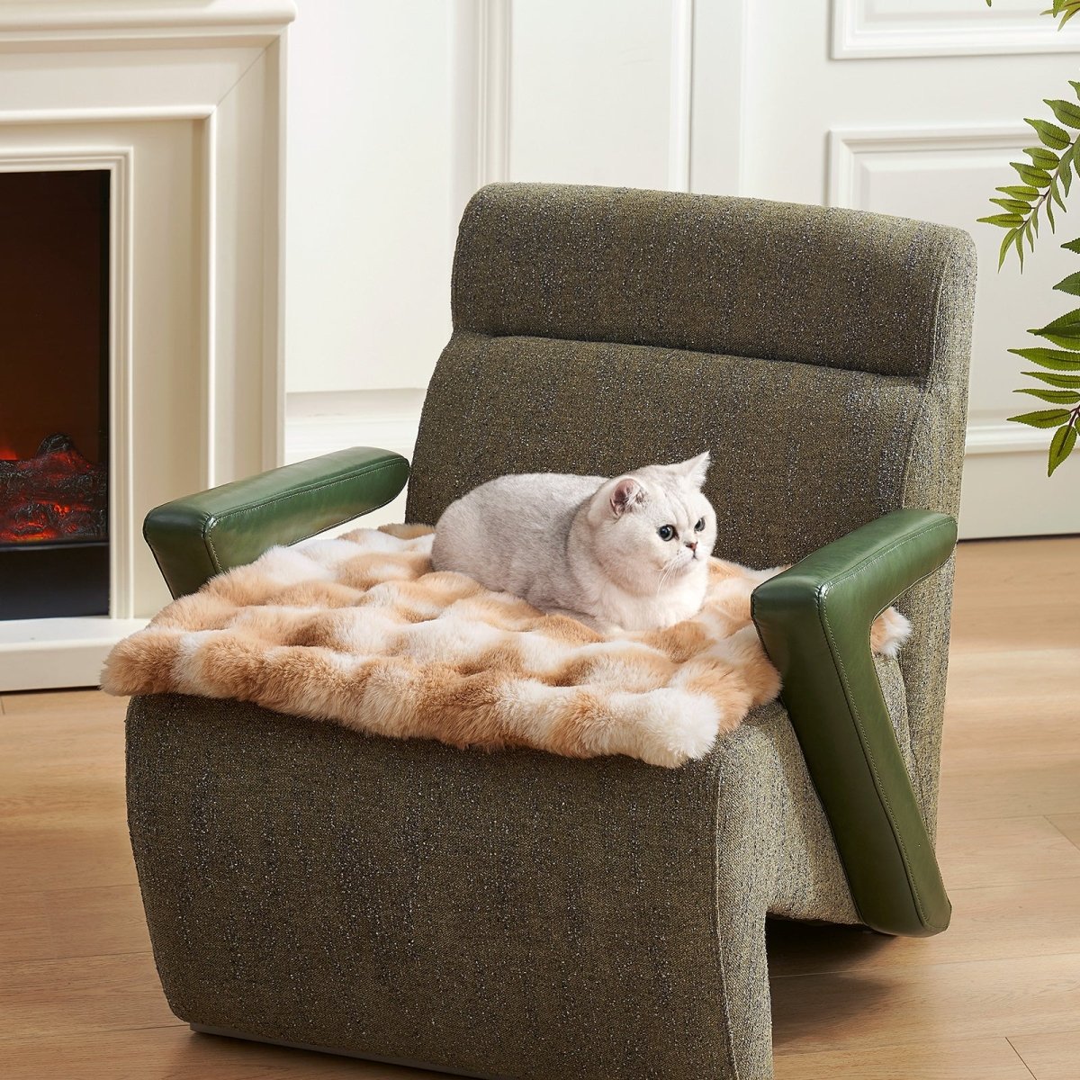 Cat sitting on a tie-dye brown fluffy couch cover on a armchair in a cozy living room.#color_Tie-dye Brown