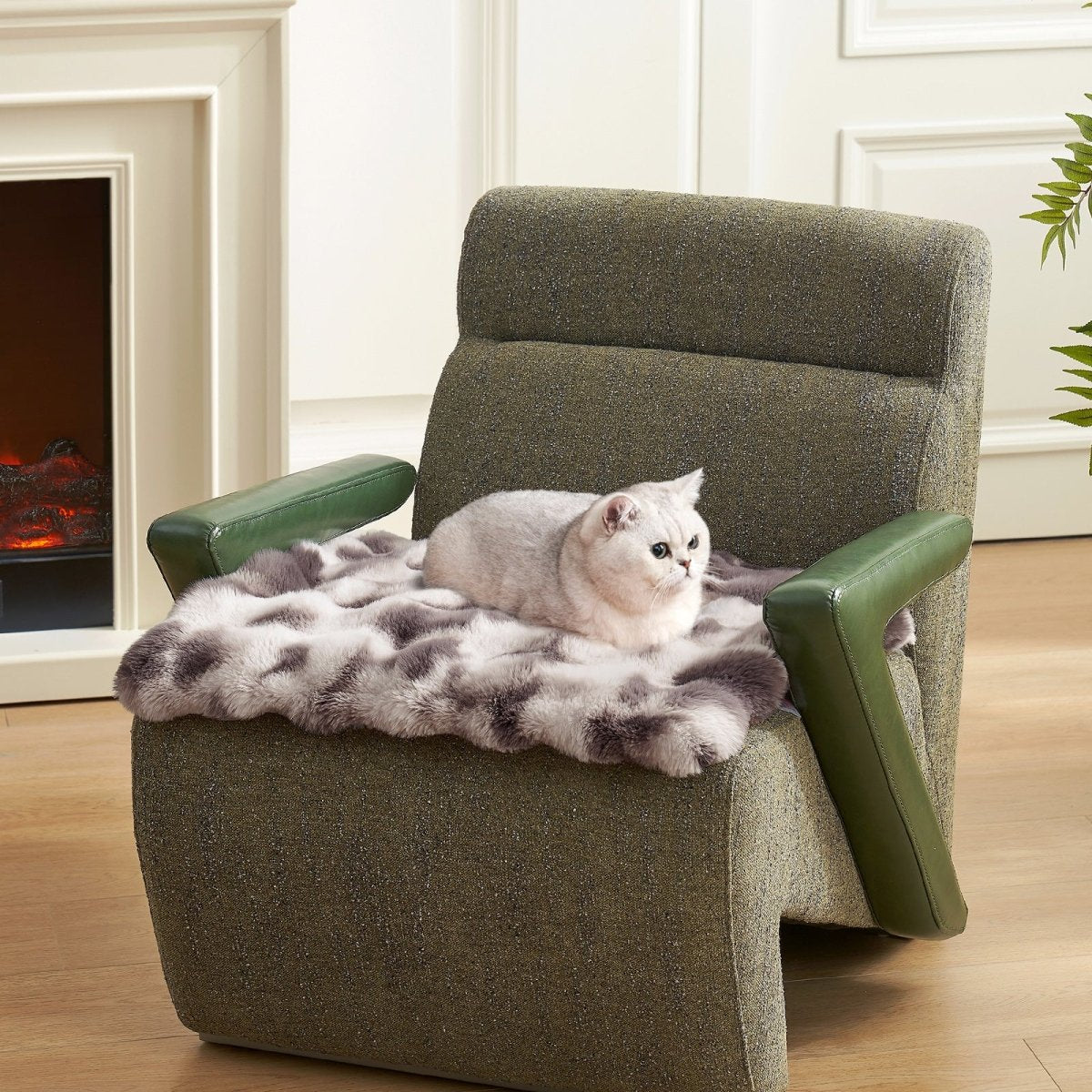 Cat sitting on a tie-dye blue fluffy couch cover on a brown armchair in a cozy living room.#color_Tie-dye Grey