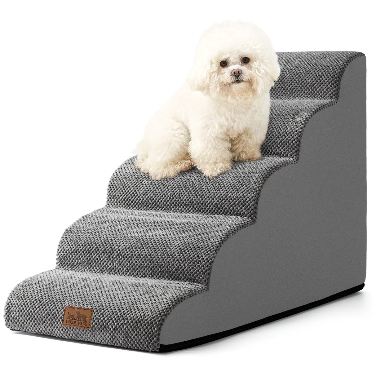 Dog sitting on a set of gray pet stairs with a white background#Color_Grey