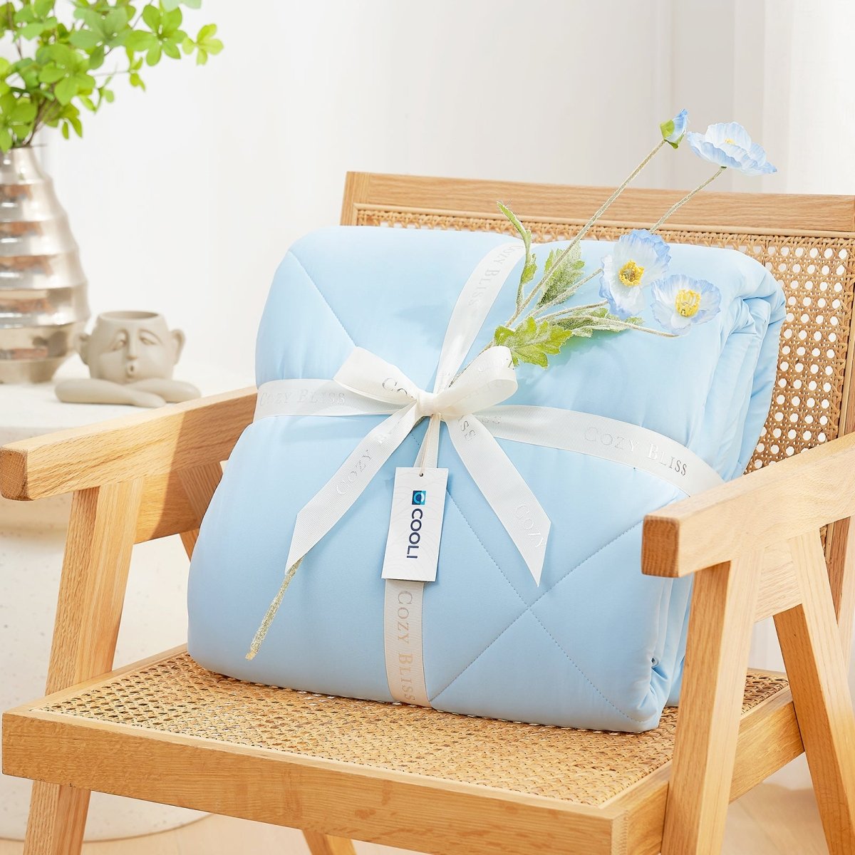 Cozy Bliss light blue cooling comforter gift, perfect for hot sleepers, with COOLI tag #Color_Sky Blue