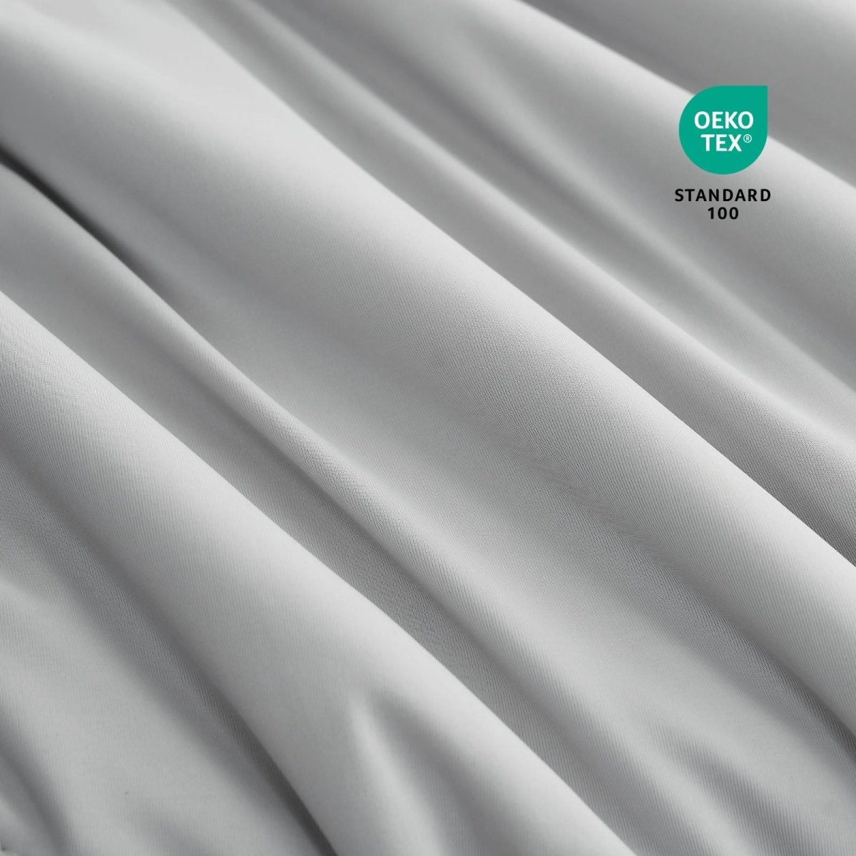 Close-up of Cozy Bliss cooling pillowcases fabric with Oeko-Tex Standard 100 certification.#color_Light Grey
