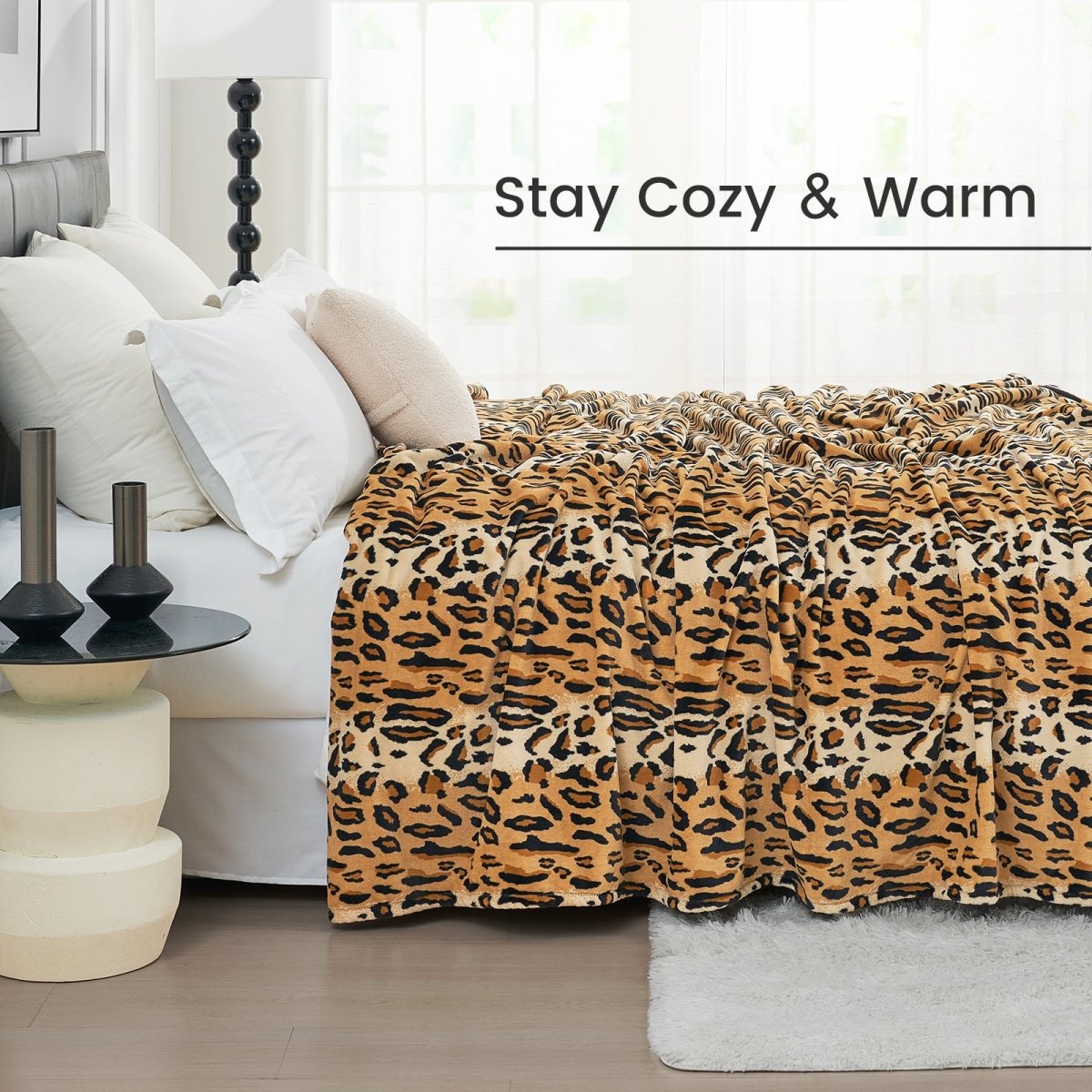 Leopard print milkyplush throw blanket in Brown Leopard layered on a bed, creating a cozy and warm sleeping environment #color_Brown Leopard