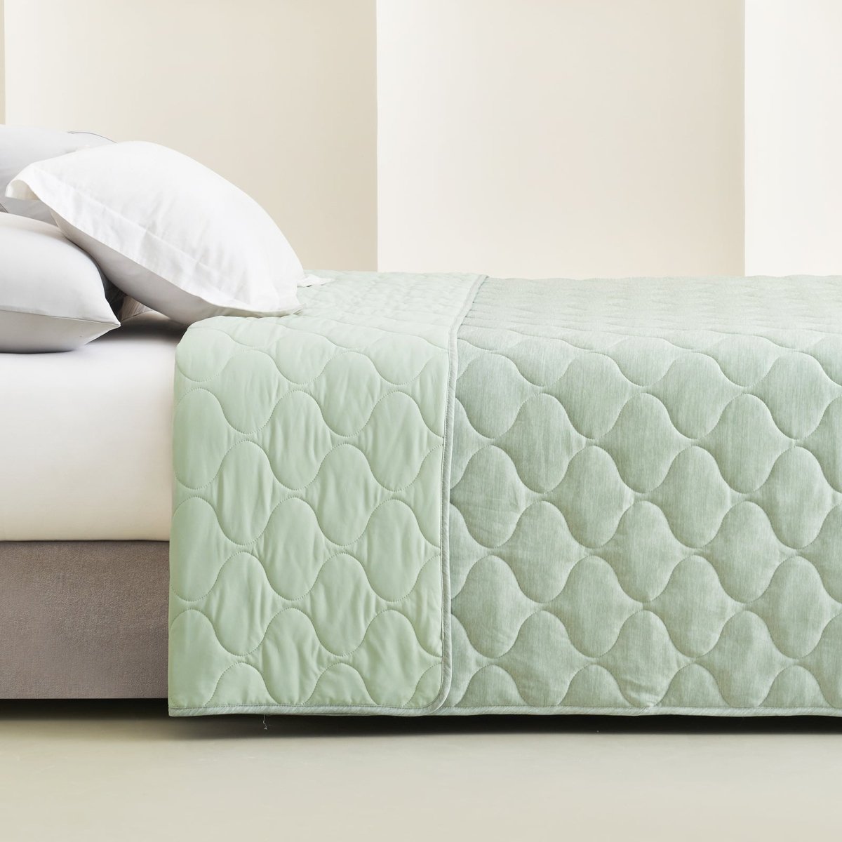 Cozy Bliss dual-sided cooling blanket in sage green with cloud pattern, premium comforter. #color_Sage Green