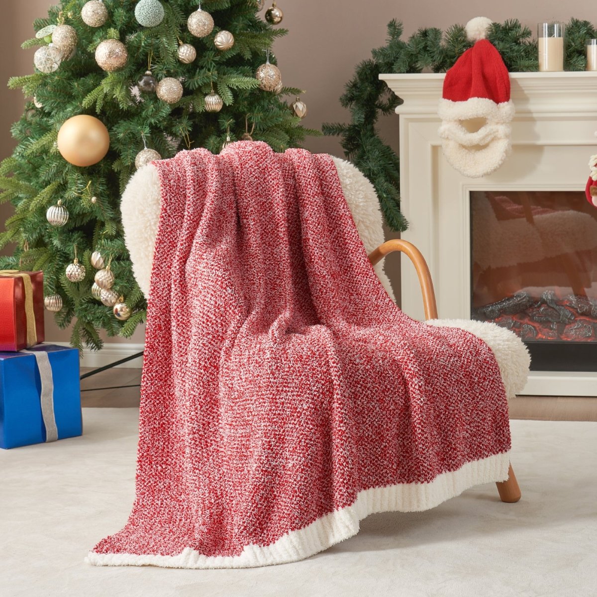Heather Feather Yarn Throw Blanket in Christmas Red draped over an armchair, creating a cozy atmosphere. #color_Christmas Red