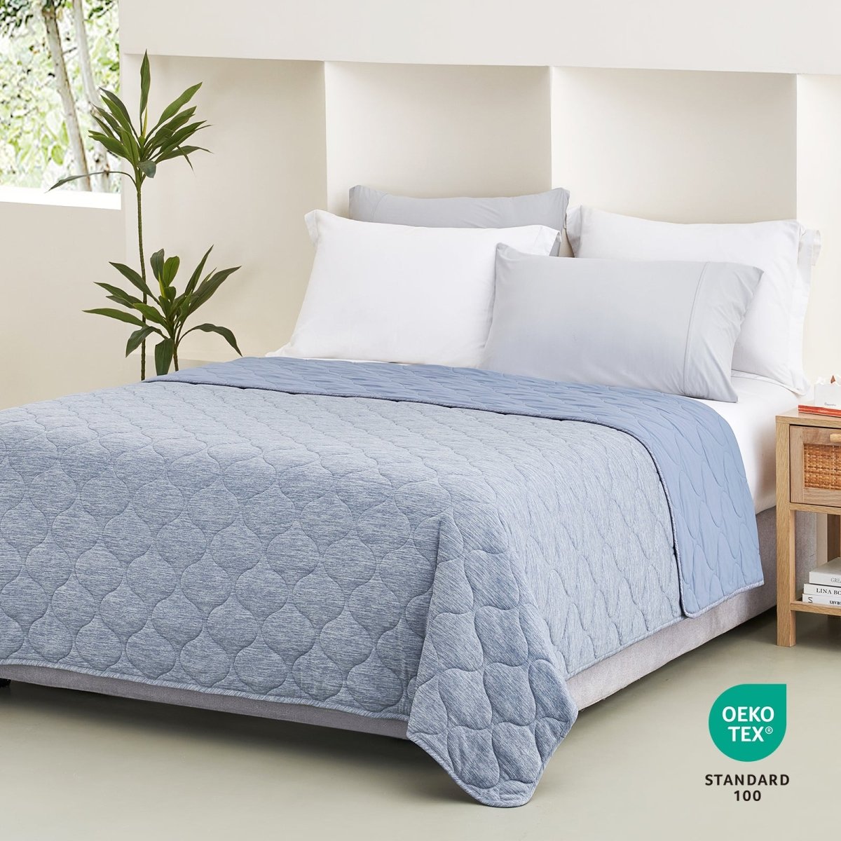 Cozy Bliss blue cooling blanket with cloud pattern, OEKO-TEX certified for cozy sleep and comfort. #color_Dark Blue