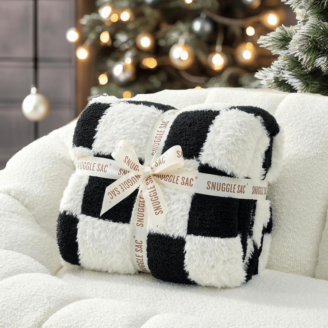 Checkered Faux Fur Feather Yarn Throw Blanket in Black & White neatly folded with ribbon, perfect for gifting. #color_Black & White