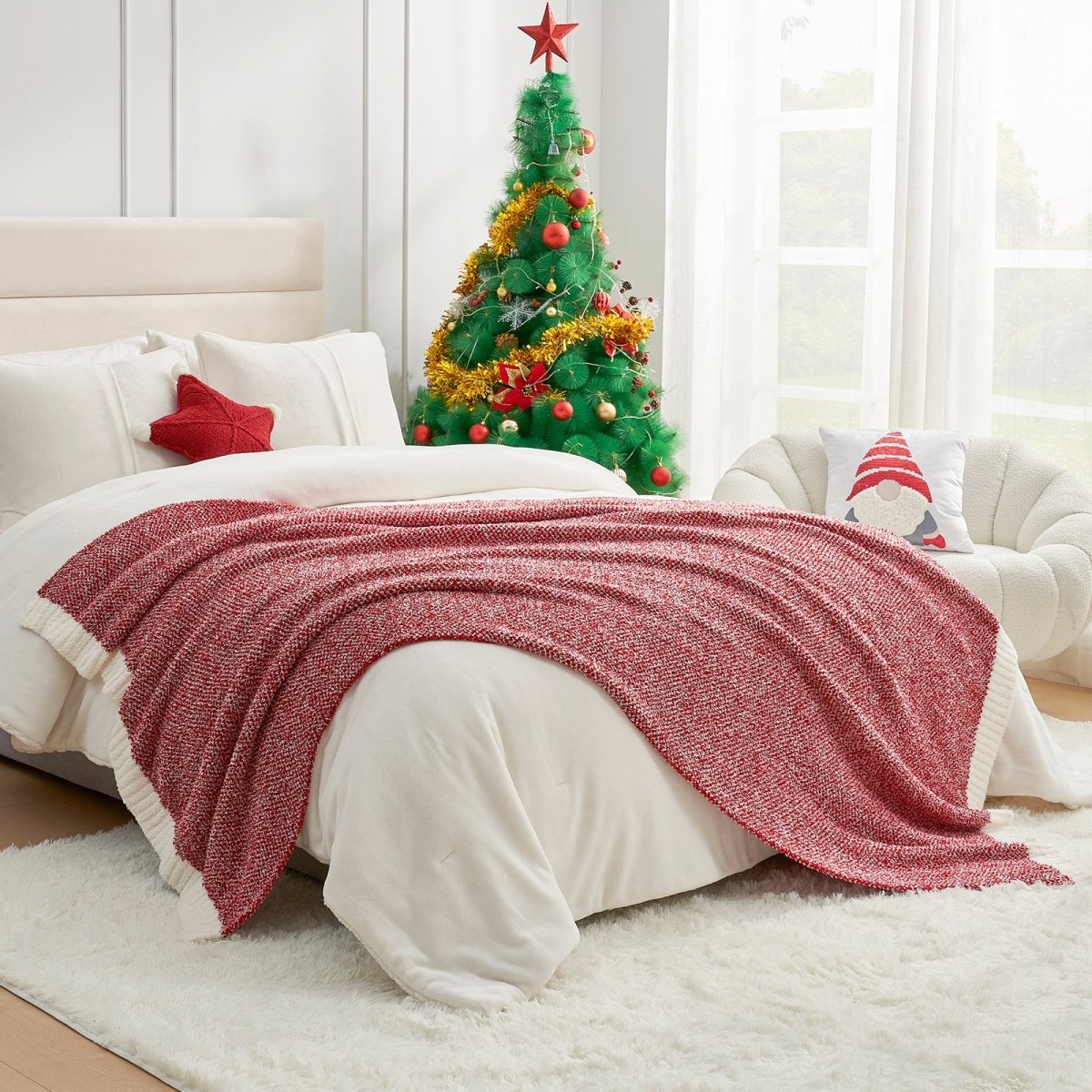 Heather Feather Yarn Throw Blanket in Christmas red styled on a bed, enhancing bedroom decor with a soft, elegant and cozy layered look. #Color_Christmas Red