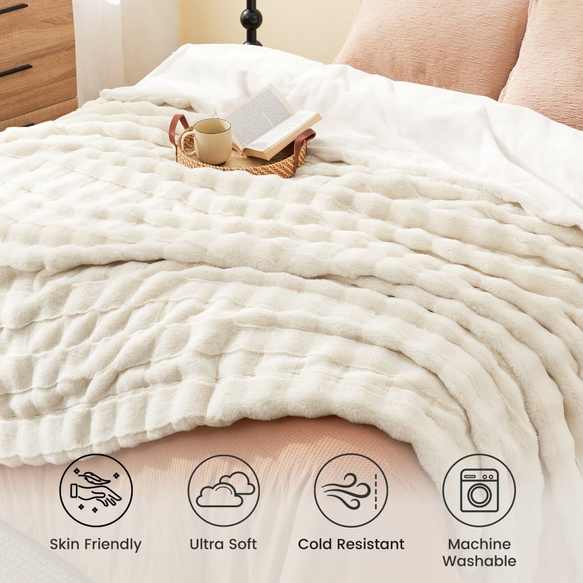 Creamy faux fur throw blanket on bed, ultra-soft and machine washable, perfect for cozy bedrooms #color_Cream White