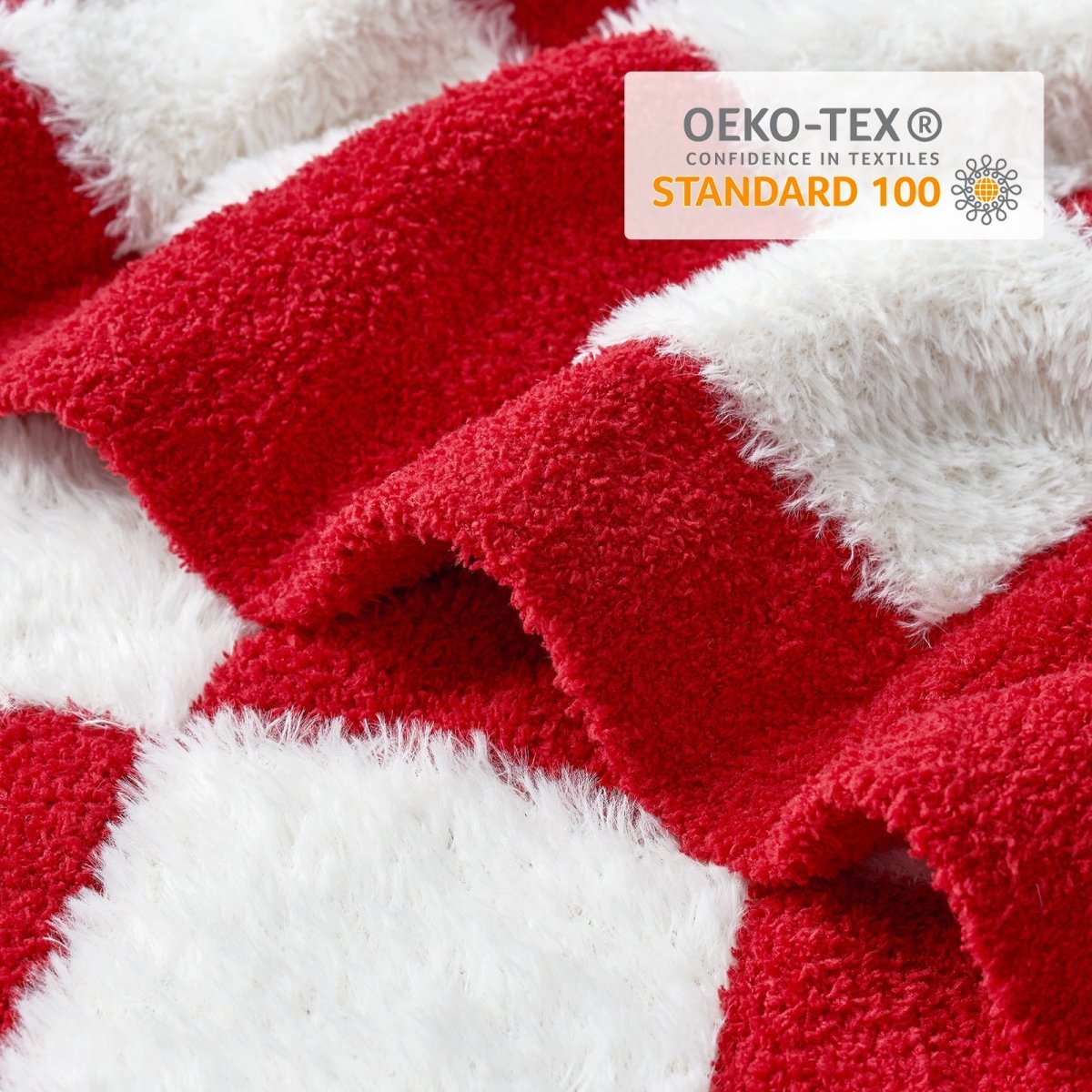 Close-up of Checkered Faux Fur Feather Yarn Throw Blanket in Red & Cream showcasing soft texture and OEKO-TEX STANDARD 100 certification. #color_Red & Cream