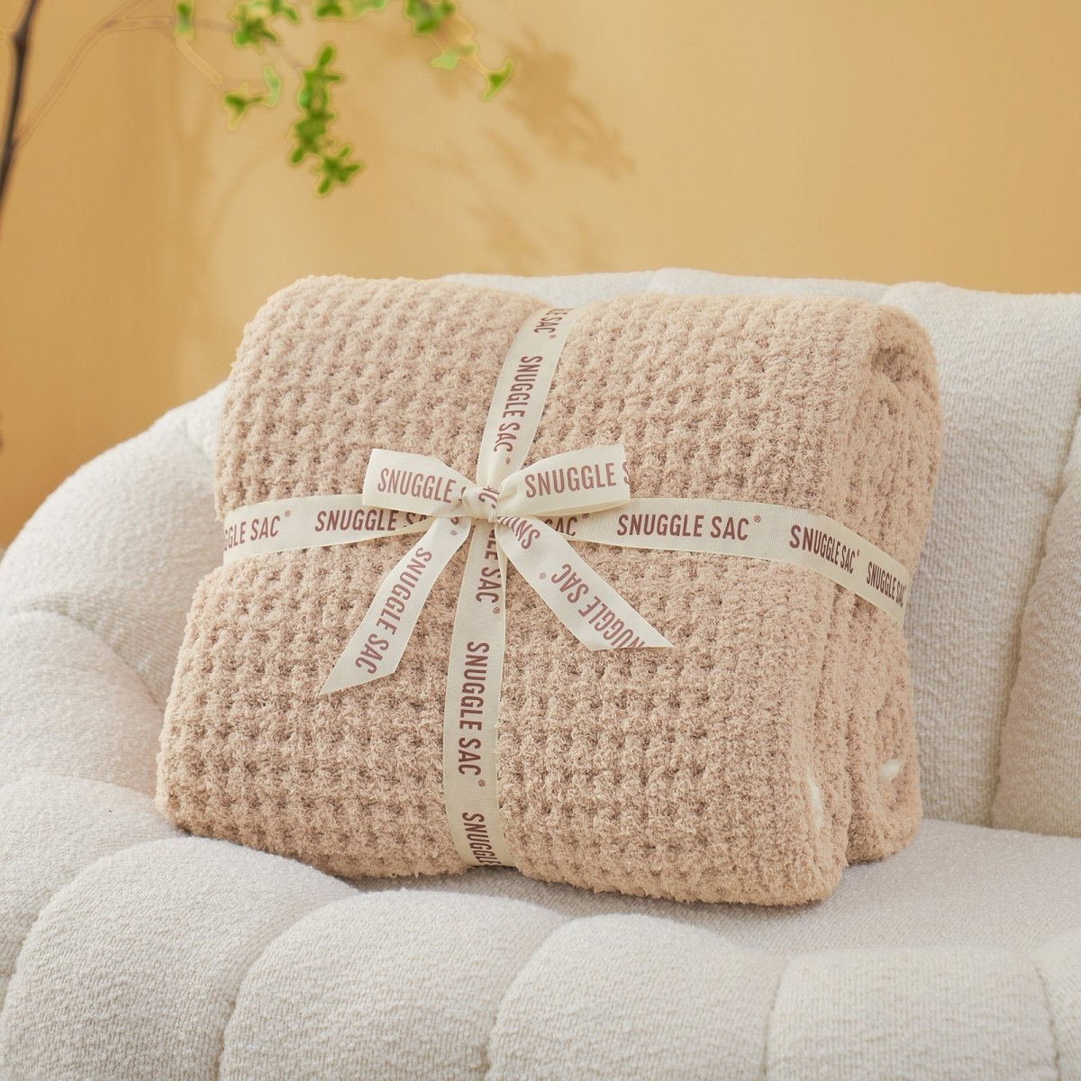 Soft Waffle Feather Yarn Throw Blanket in Light Brown neatly folded as gift packaging, ideal for gifting. #color_Light Brown