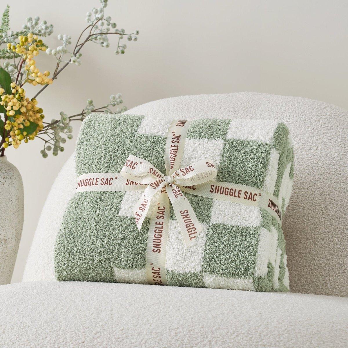 Checkered Feather Yarn Knit Throw Blanket in Sage Green & White neatly folded as gift packaging, ideal for gifting. #color_Sage Green & White