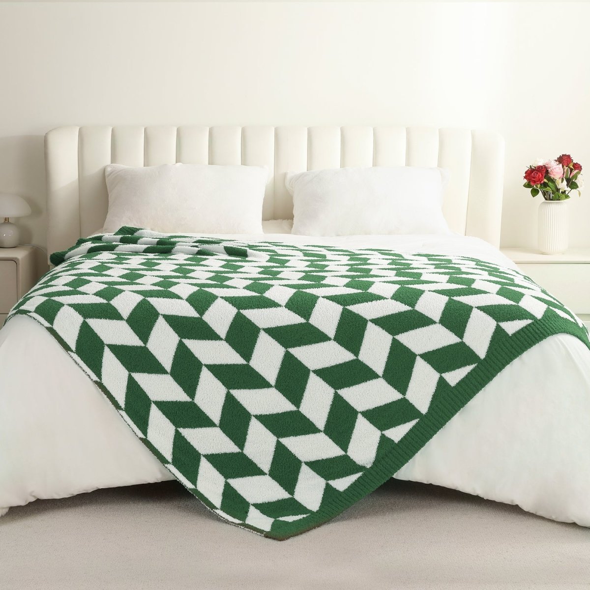 Chevron Feather Yarn Knit Throw Blanket in Xmas Green styled on a bed, highlighting soft texture and modern chevron pattern in a bright bedroom setting. #color_Xmas Green
