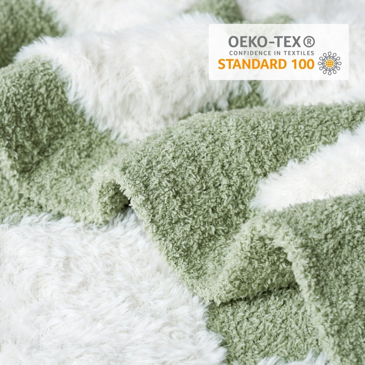 Close-up of Checkered Faux Fur Feather Yarn Throw Blanket in Sage Green & White showcasing plush texture and OEKO-TEX STANDARD 100 certification. #color_Sage Green & White