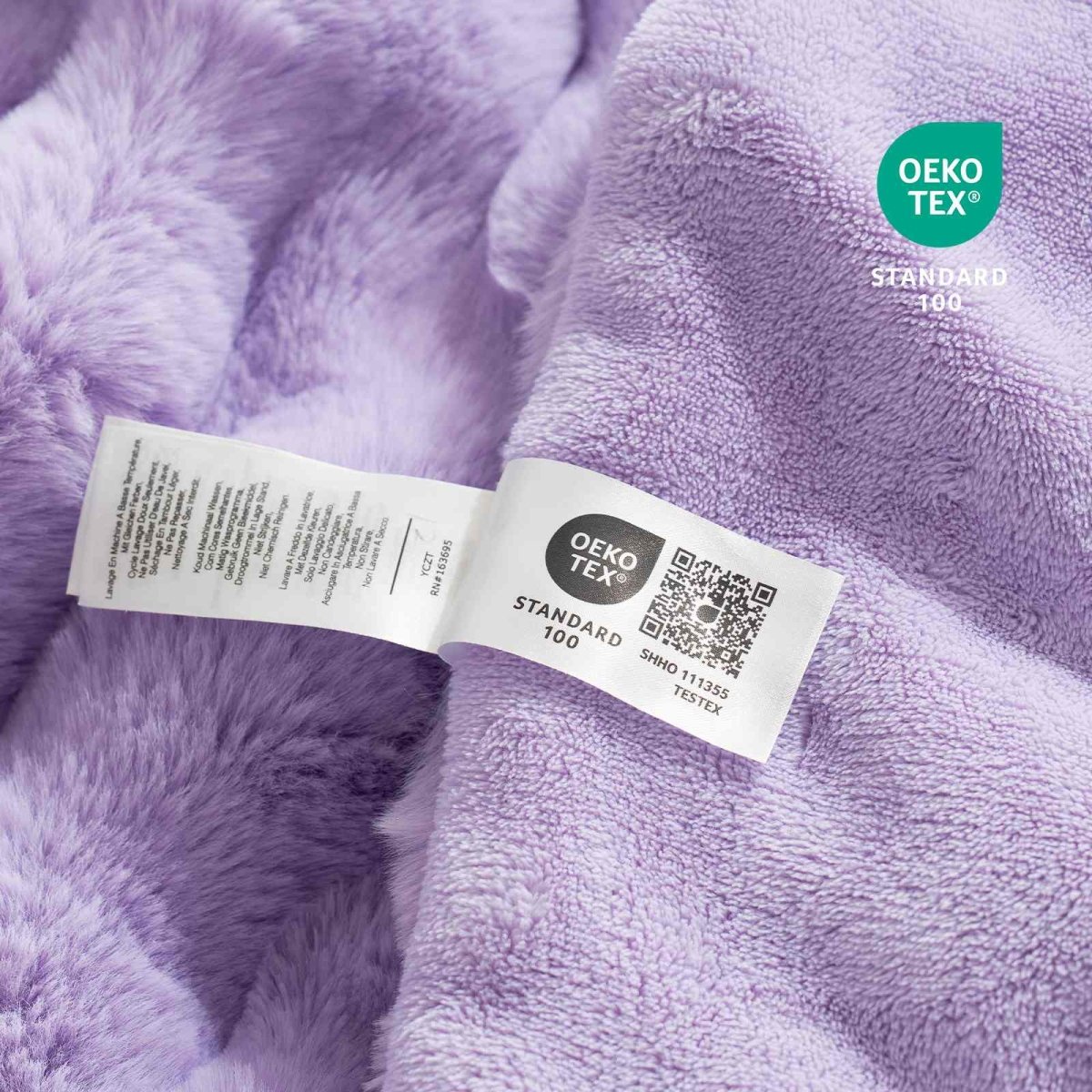 Close-up of OEKO-TEX certified faux fur purple blanket fabric #color_Purple