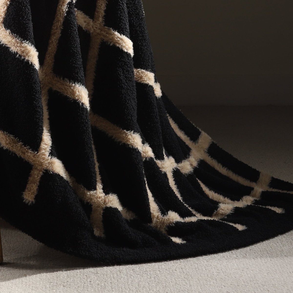 Close-up of faux mink texture on Faux Mink Textured Plaid Knit Throw Blanket in Black highlighting plush softness and cozy feel. #color_Black