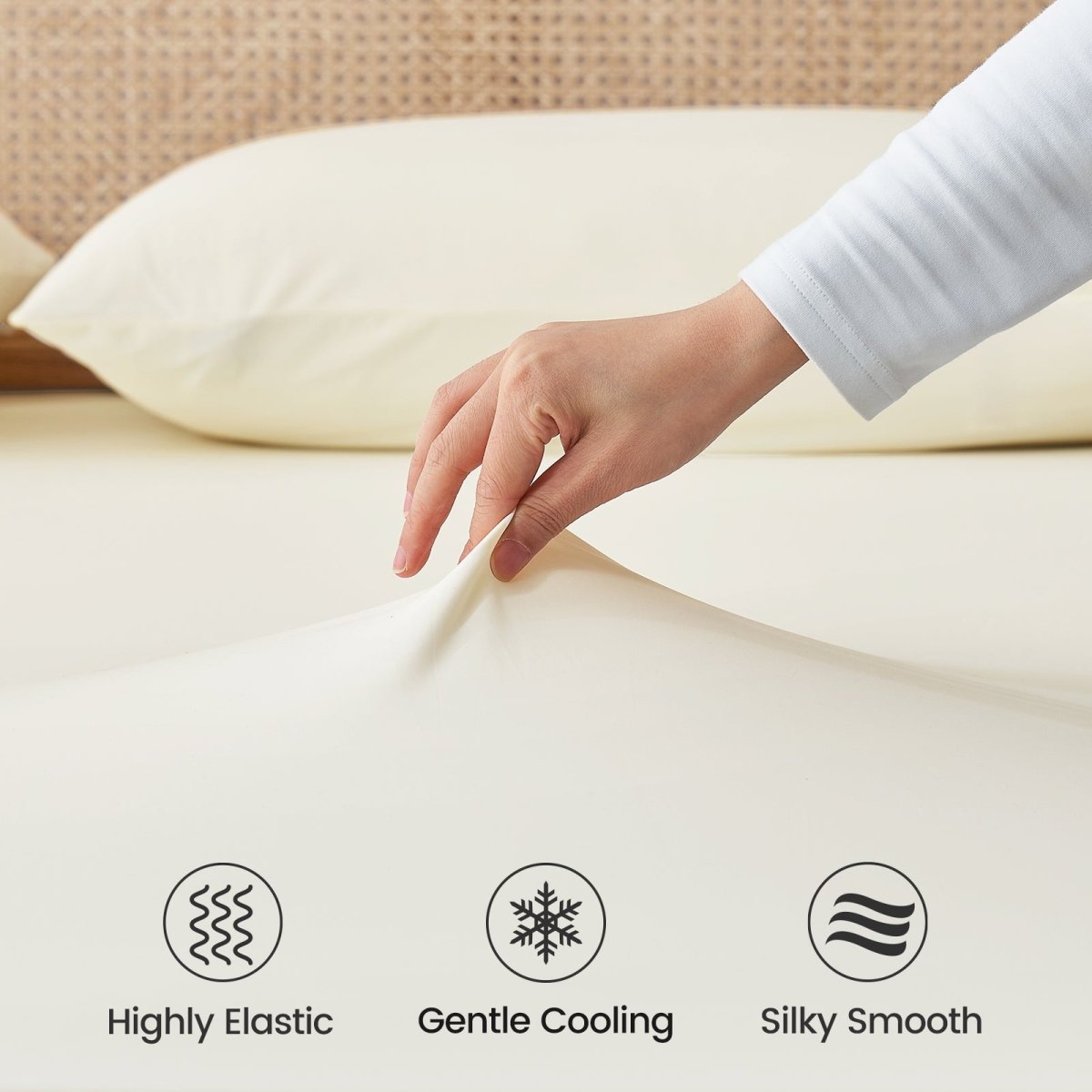 Hand touching a pillow with features labeled 'Highly Elastic', 'Gentle Cooling', and 'Silky Smooth'. #Color_Cream White
