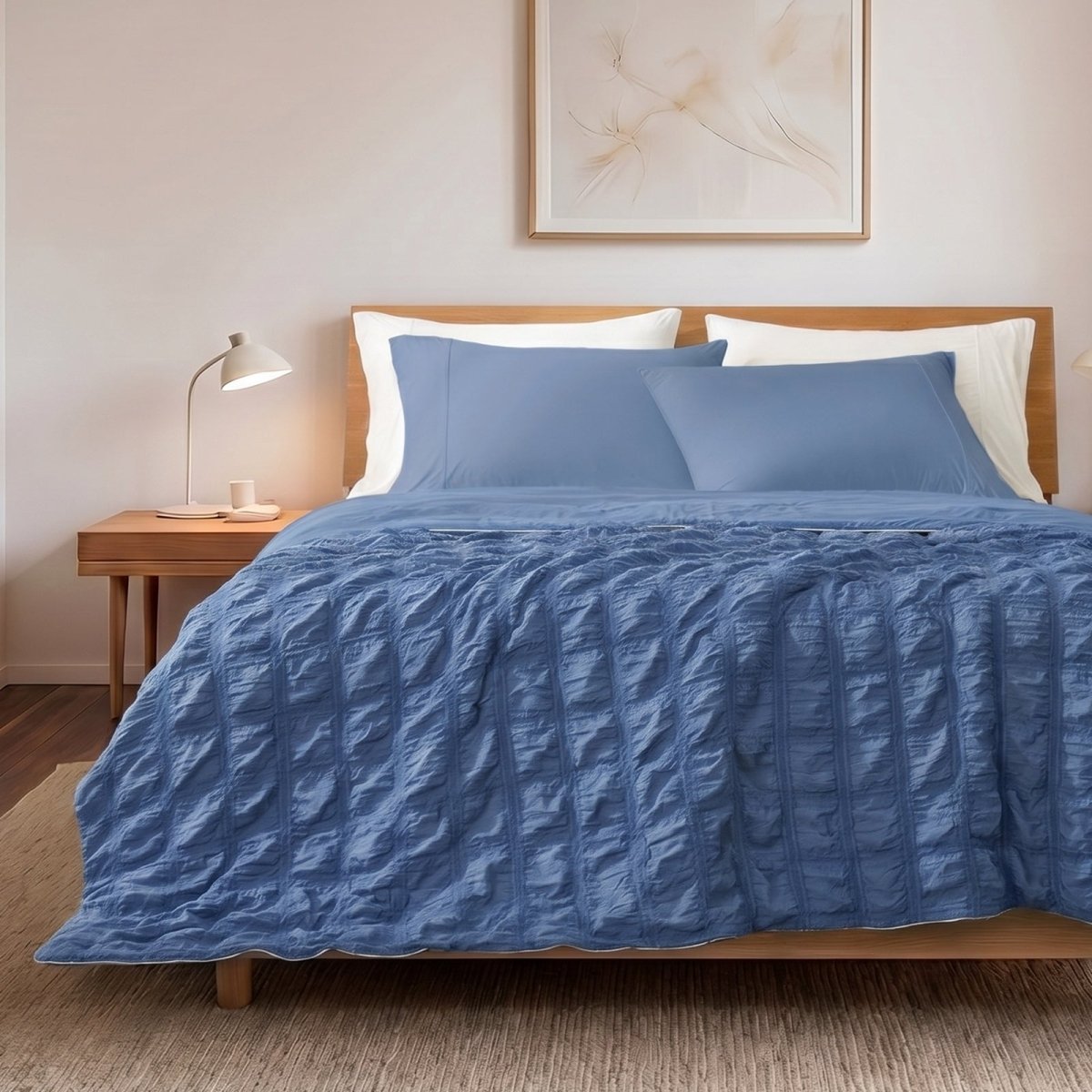Cozy Bliss seersucker cooling comforter in front view.#color_Dark Blue