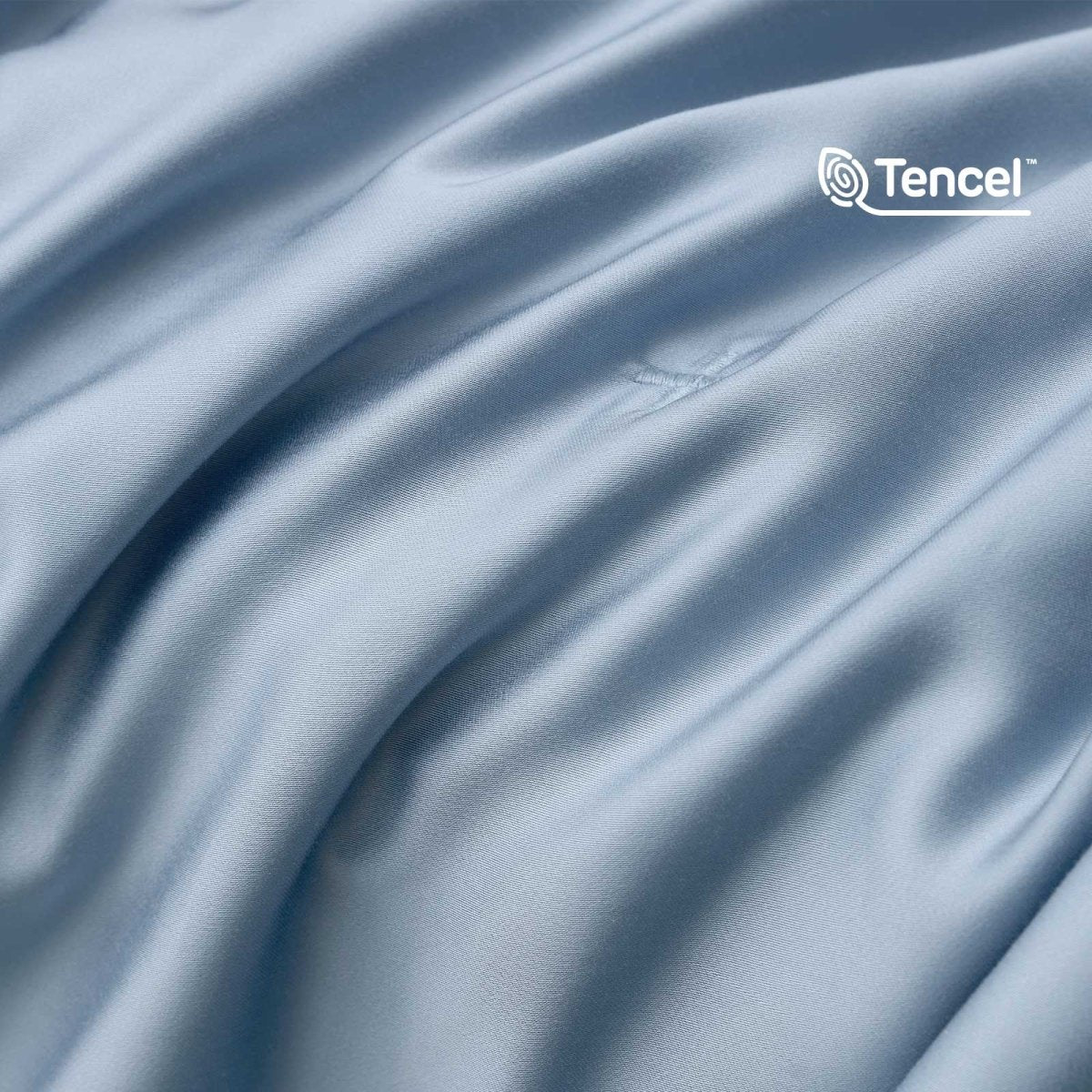 Close up of silky smooth Tencel™ lyocell cooling fabric with OKEO-TEX Standard 100 certification.#Color_Dark Blue