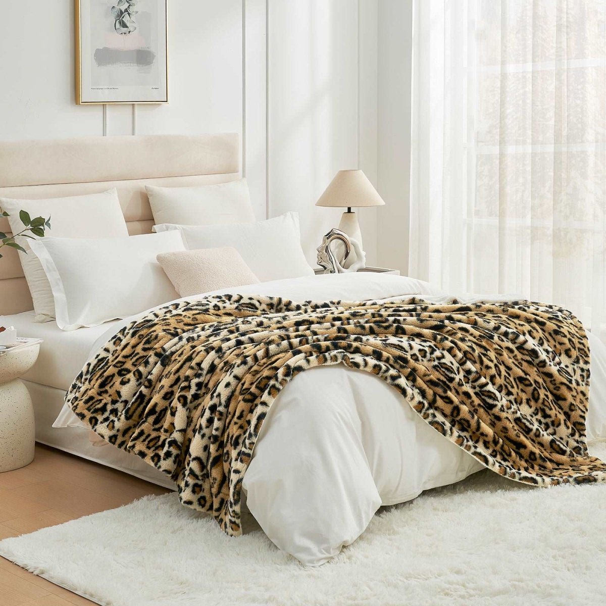 Leopard print faux fur blanket on a bed. A cozy, soft, and breathable blanket for stylish bedroom decor. #color_Brown Leopard