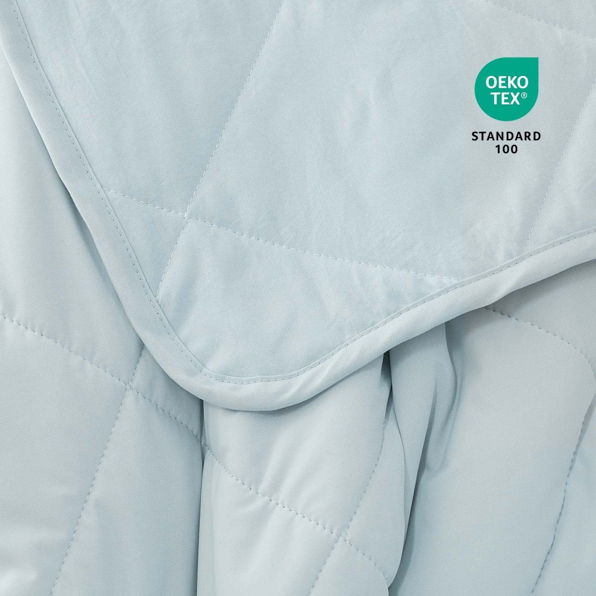 Close-up of Cozy Bliss cooling blanket with Oeko-Tex certification for safe materials #Color_Cool Blue