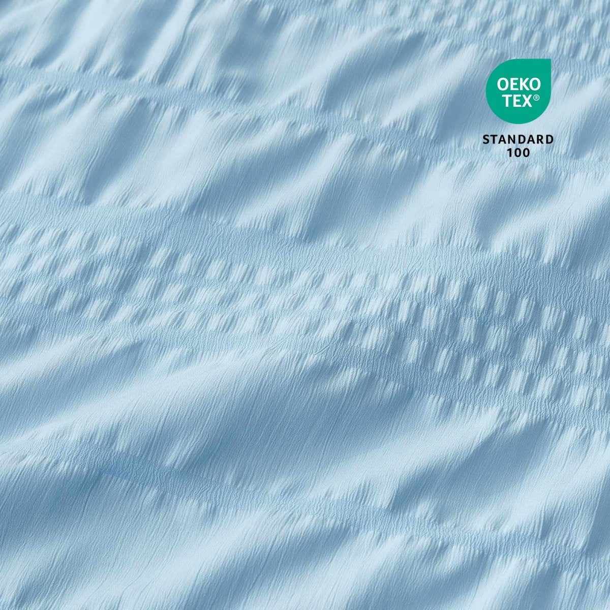 Close-up of Cozy Bliss  cooling fabric with OEKO-TEX Standard 100 certification.#color_Sky Blue