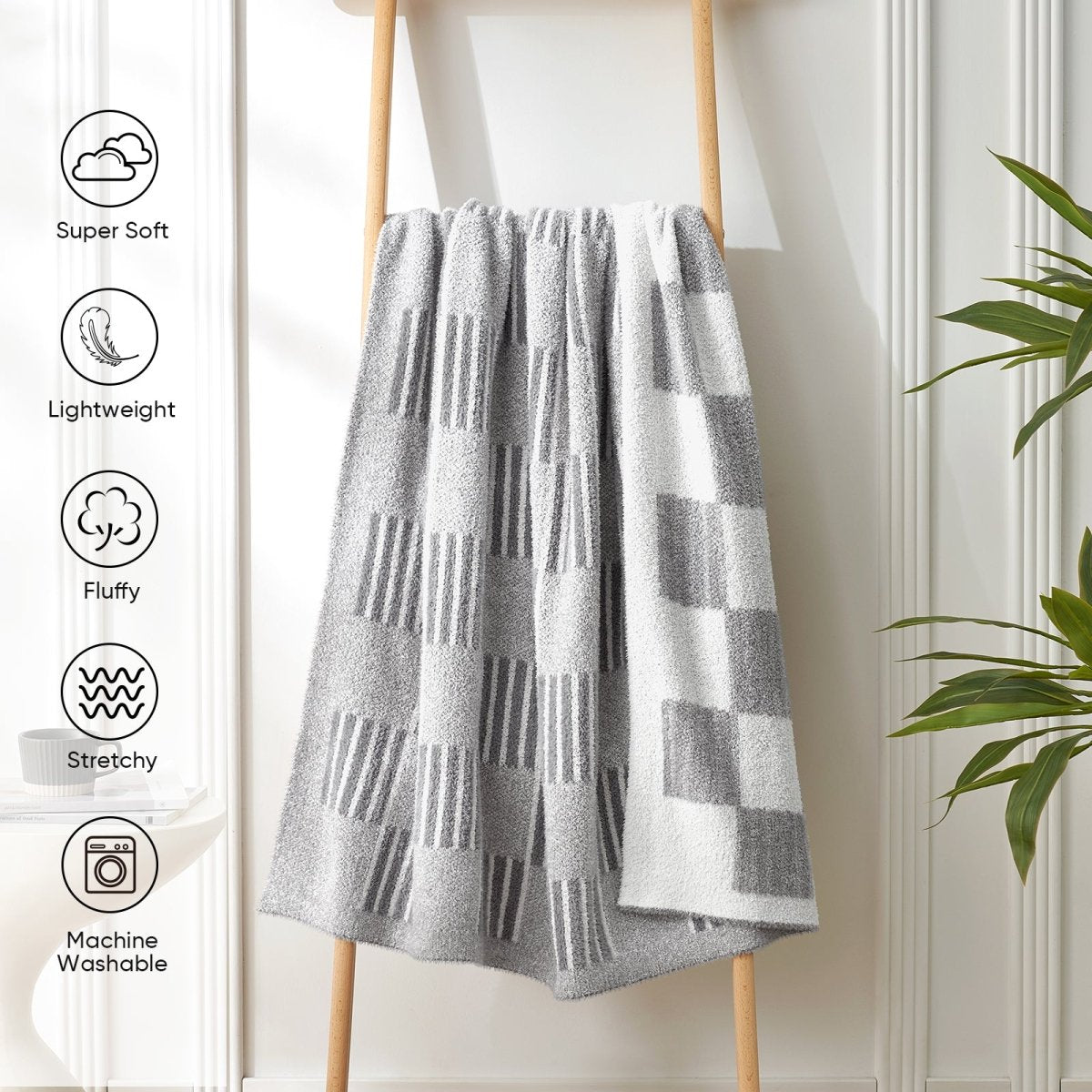 Reversible Heather Checkered Feather Yarn Throw Blanket in Grey displayed on a rack, featuring soft, lightweight, fluffy and machine washable design. #color_Grey