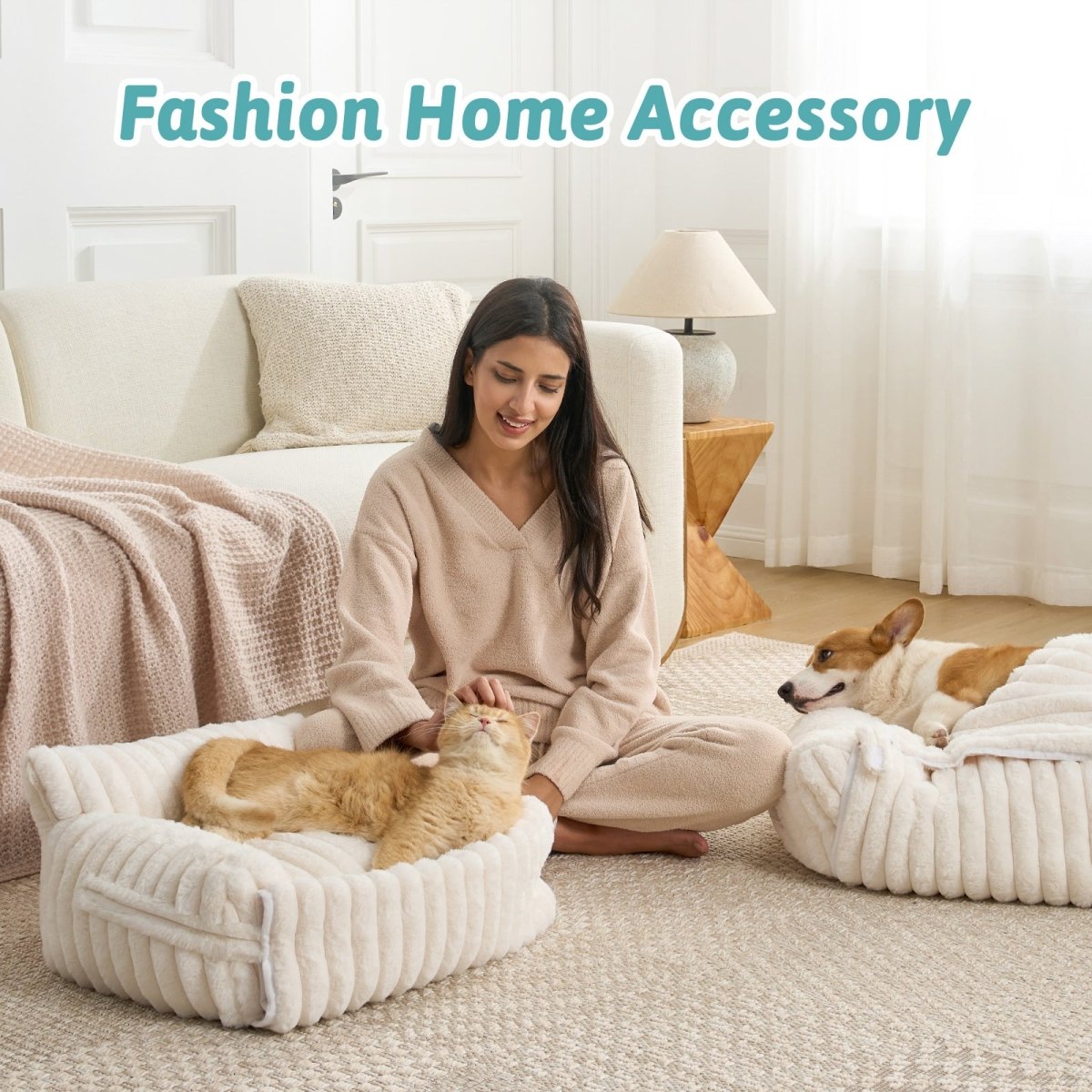 Woman sitting besides pet beds in a cozy living room.#color_Cream White
