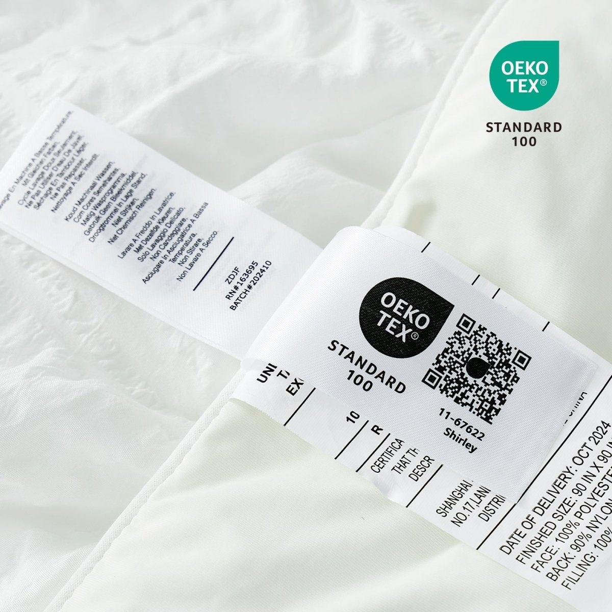 OEKO-TEX Standard 100 certified cooling comforter with care label, white bedding. #Color_Off White