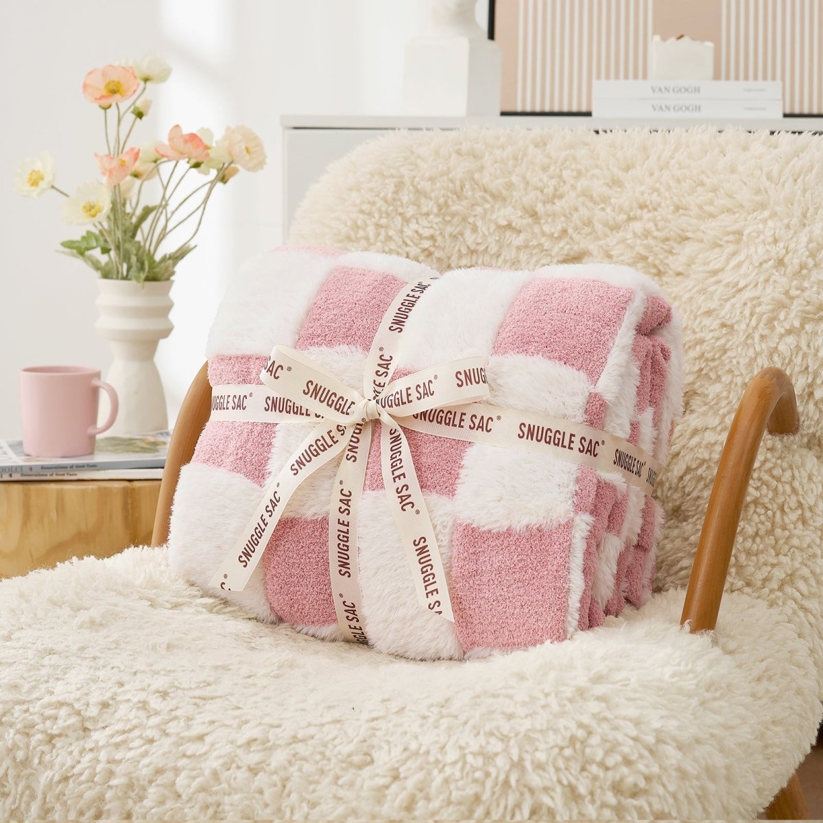 Checkered Faux Fur Feather Yarn Throw Blanket in Pink White neatly folded with ribbon, ideal for gifting. #Color_Pink white