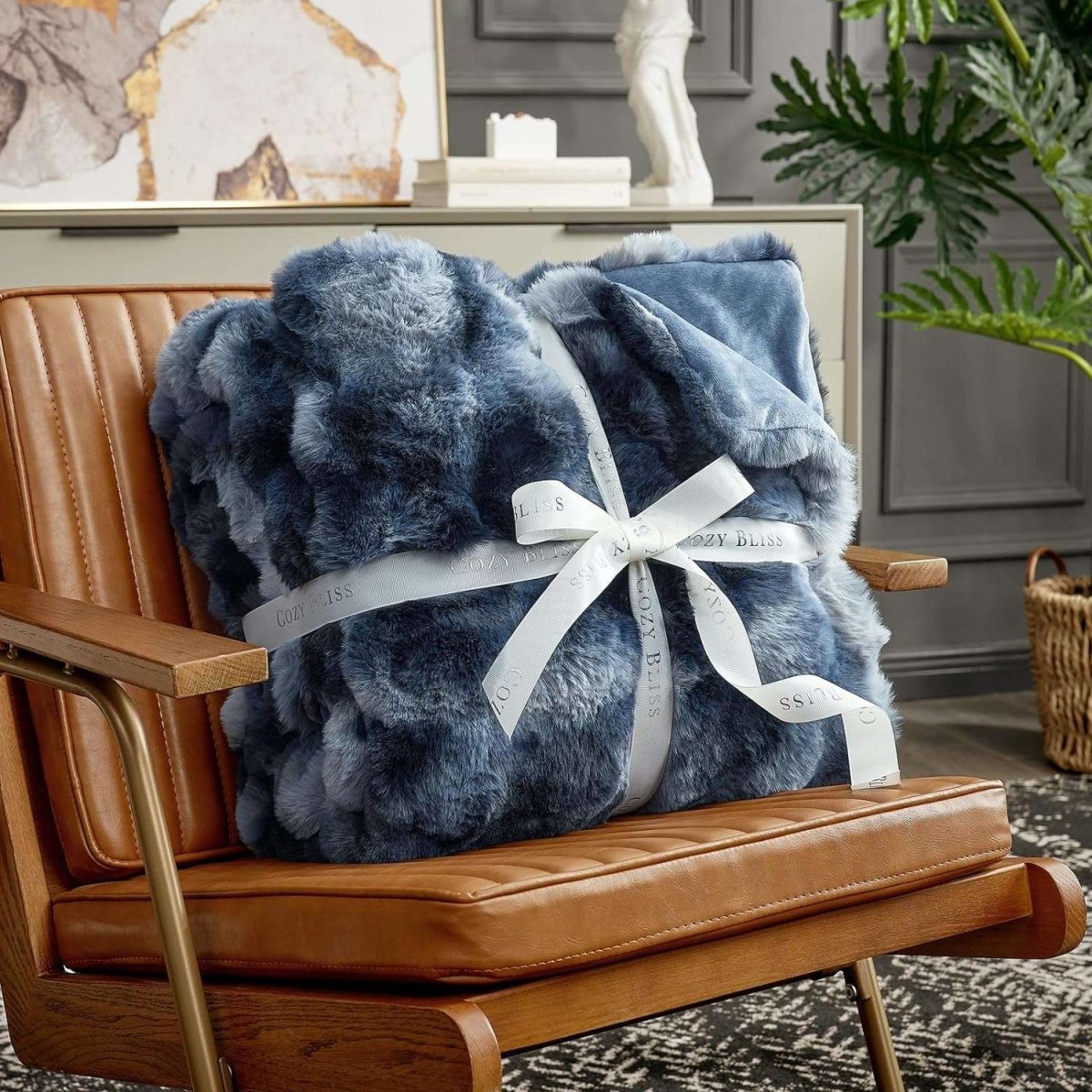 Fluffy tie-dye blue blanket with a bow on an armchair #color_Tie-dye Blue