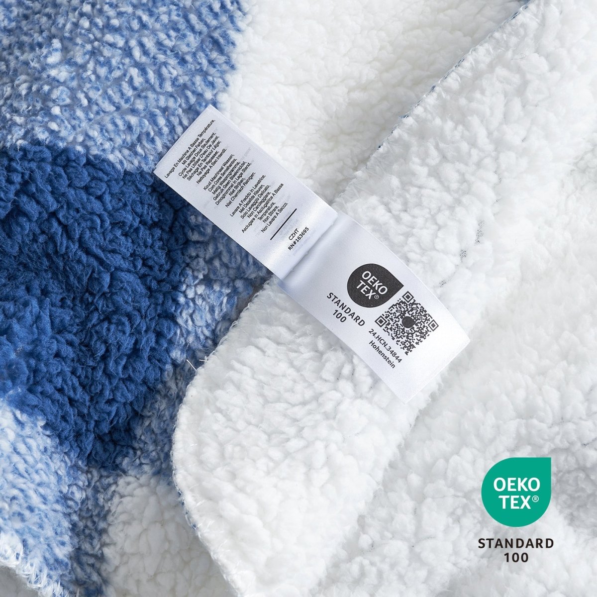 Close up of buffalo sherpa throw blanket in Buffalo Plaid-navy blue, showcasing soft sherpa texture and OEKO TEX STANDARD 100 certification #color_Buffalo Plaid-navy blue