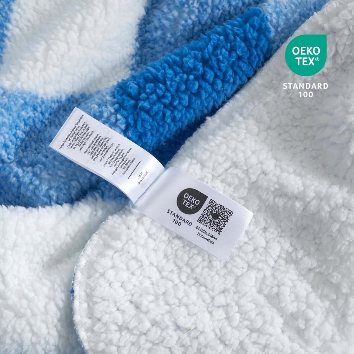 Close up of buffalo sherpa throw blanket in Buffalo Plaid-light blue, showcasing soft sherpa texture and OEKO TEX STANDARD 100 certification #color_Buffalo Plaid-light blue