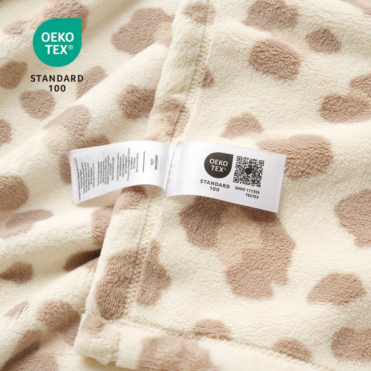 Close up of leopard print milkyplush throw blanket in Khaki Leopard, showcasing soft fabric and OEKO TEX STANDARD 100 certification #color_Khaki Leopard