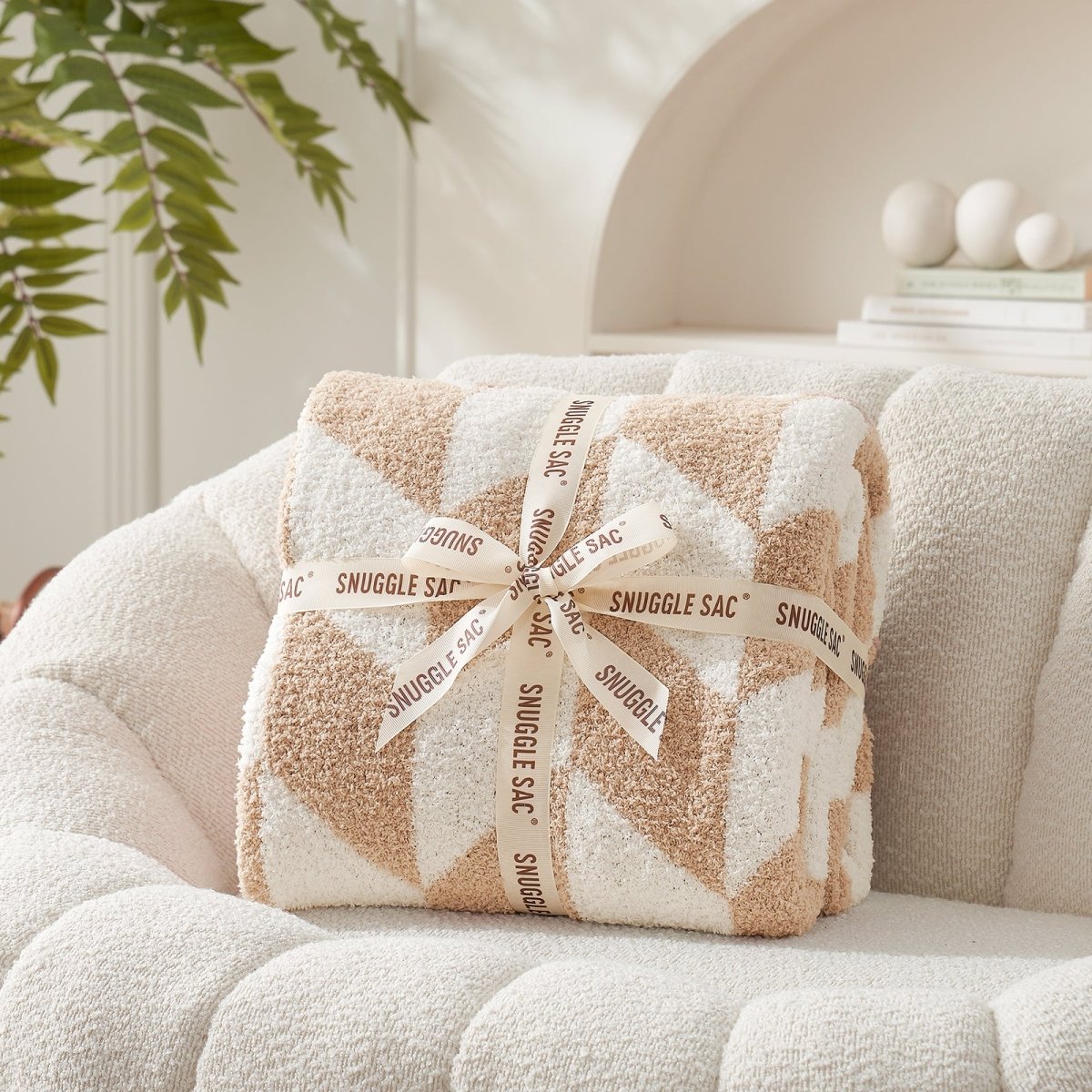 Chevron Feather Yarn Knit Throw Blanket in Beige neatly folded with ribbon packaging, perfect as a cozy gift for holidays and special occasions. #color_Beige