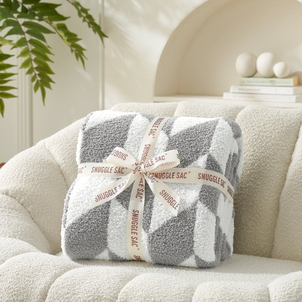 Chevron Feather Yarn Knit Throw Blanket in Grey neatly folded with ribbon packaging, perfect as a cozy gift for holidays and special occasions. #color_Grey