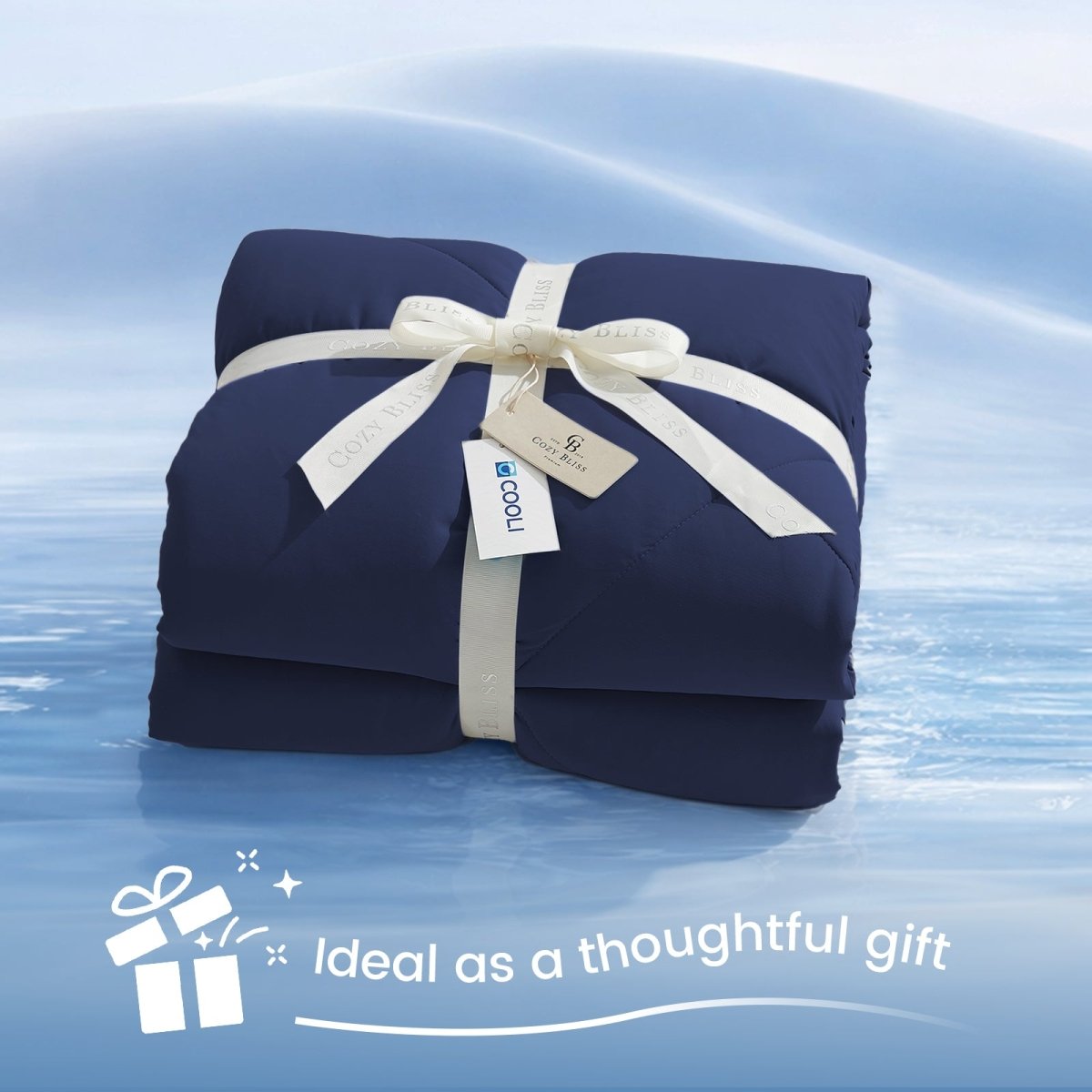 Cozy Bliss Cloud-Like Extra Cooling Comforter in navy blue wrapped as a gift, perfect cozy and stylish present.#Color_Navy Blue
