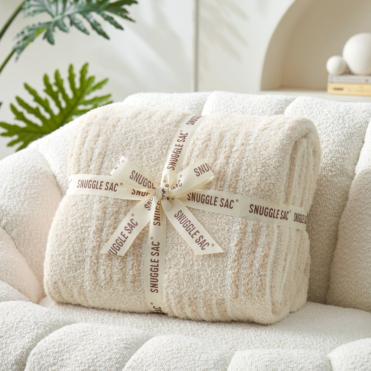 Reversible Heather Checkered Feather Yarn Throw Blanket in Cream White neatly folded with ribbon, making it a perfect gift choice. #color_Cream White