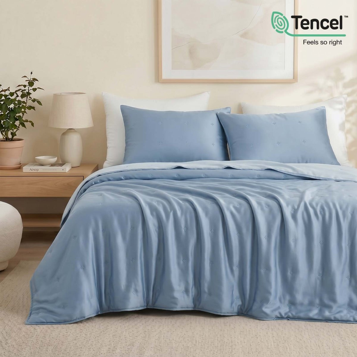 Cozy Bliss Luxurious Tencel™ Lyocell Cooling Comforter in white front view.#Color_Dark Blue