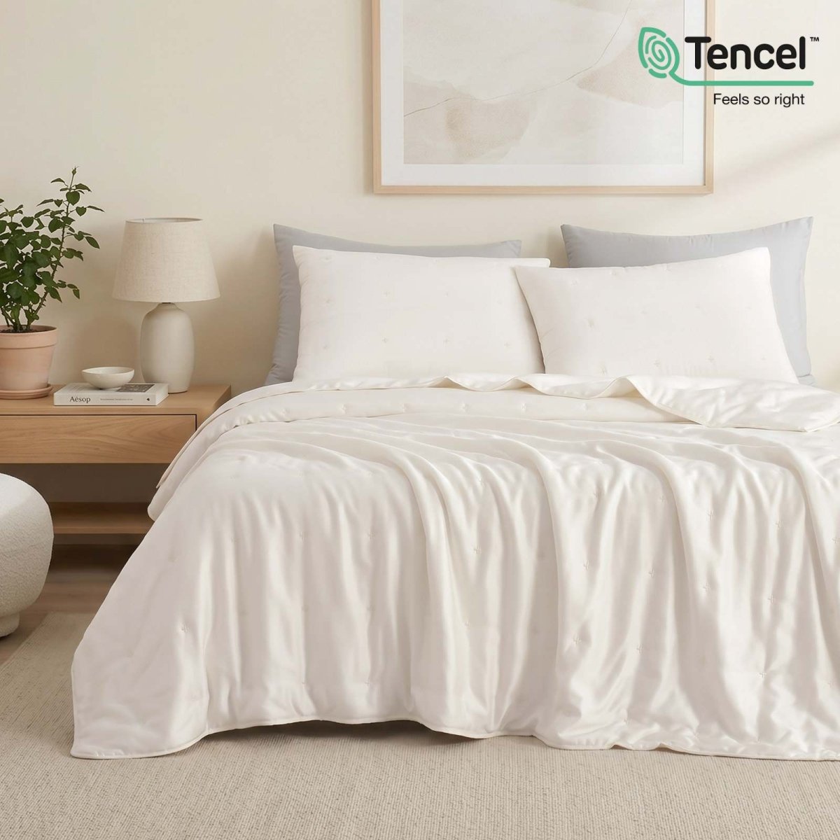 Cozy Bliss Luxurious Tencel™ Lyocell Cooling Comforter in white front view.#Color_Off White