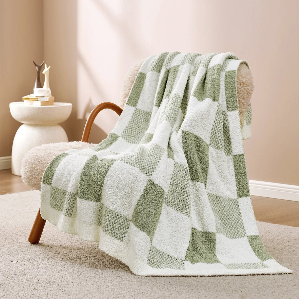 Checkered Feather Yarn Throw Blanket in Sage Green & White front view draped over an armchair, showcasing soft feather yarn texture and checkered pattern design. #color_Sage Green & White