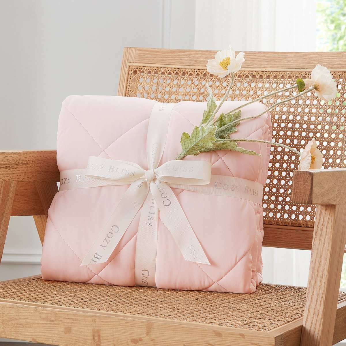 Cool pink Cozy Bliss airflow breathable cooling blanket wrapped as a gift, perfect cozy and stylish present. #Color_Cool Pink