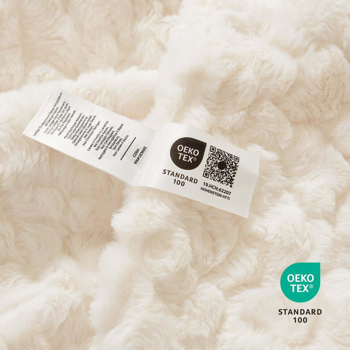 OEKO-TEX STANDARD 100 certified faux fur blanket texture close-up #color_Cream White
