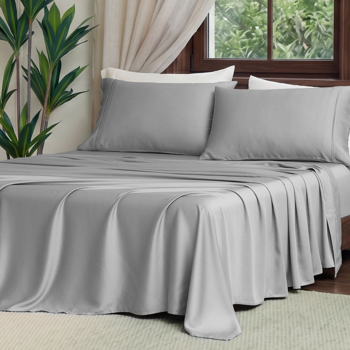 Front view of Cozy Bliss Tencel™ Eco-friendly Silky Sheet Set on a bed, showcasing smooth drape and elegant bedding style. #color_Grey
